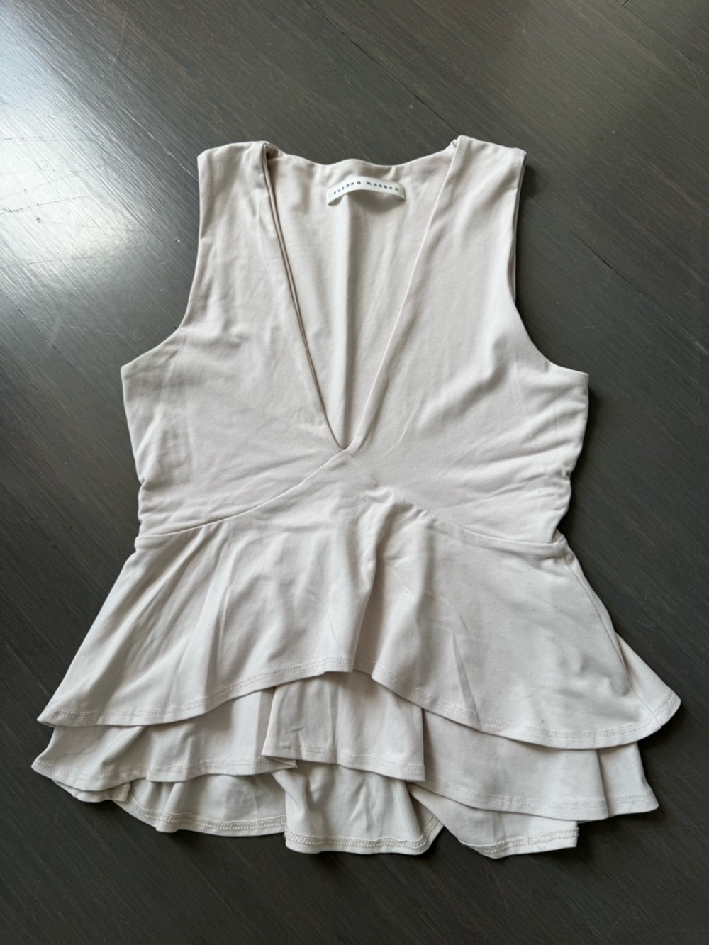 Susana Monaco Sleeveless Deep V Peplum Top in Light Beige